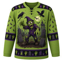 Load image into Gallery viewer, Ugly Halloween Zombie Shuffle Hockey Jersey in Zombie Green, front view – zombie green body with black yoke with goofy cartoon zombies shuffling from cracked earth with rising hands, tombstones and crows, zombie-hand yoke, zombie-hand sleeve bands and a tombstone hem band – custom name and number