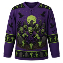 Load image into Gallery viewer, Ugly Halloween Zombie Shuffle Hockey Jersey in Witch Purple, front view – witch purple body with black yoke with goofy cartoon zombies shuffling from cracked earth with rising hands, tombstones and crows, zombie-hand yoke, zombie-hand sleeve bands and a tombstone hem band – custom name and number