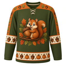 Load image into Gallery viewer, Ugly Thanksgiving Acorn Squirrel Hockey Jersey in Forest Olive, front view – forest olive body with orange yoke with a round chubby cartoon squirrel crest hugging a giant acorn on an oak branch, acorn and leaf yoke, acorn sleeve bands and an acorn and pumpkin hem band – custom name and number