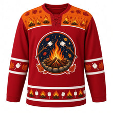 Load image into Gallery viewer, Ugly Thanksgiving Autumn Bonfire Night Hockey Jersey in Cranberry Red, front view – round crest of a campfire in a stone ring under a starry night sky with marshmallows on sticks and autumn leaves, orange yoke of small campfires and leaves, marshmallow-on-stick and leaf sleeve bands and a hem of mini campfires alternating with marshmallows – custom name and number