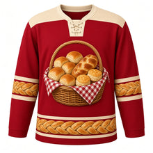 Load image into Gallery viewer, Ugly Thanksgiving Harvest Bread Basket Hockey Jersey in Cranberry Red, front view – cranberry red body with wheat cream yoke with a round crest of an overflowing woven wicker basket lined with red gingham and piled with golden dinner rolls, a braided loaf and flaky biscuits, basket-weave yoke, biscuit and braided-twist sleeve bands and a mini bread-basket hem band – custom name and number