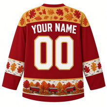 Load image into Gallery viewer, Ugly Thanksgiving Covered Bridge Foliage Hockey Jersey in Bridge Red, back view – barn red body with birch gold oak-leaf yoke, birch-bark sleeve bands with oak leaves, a hem band of little red covered bridges among fall trees, straight YOUR NAME lettering and 00 – custom name and number