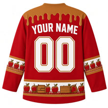 Load image into Gallery viewer, Ugly Thanksgiving Caramel Apple Stand Hockey Jersey in Candy Apple Red, back view with a caramel-drip yoke, caramel apple and plaid sleeve bands, caramel apple and crate hem band, arched YOUR NAME lettering and 00 – custom name and number