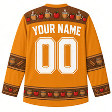 Load image into Gallery viewer, Ugly Thanksgiving Apple Cider Barrel Hockey Jersey in Cider Amber, back view with a mug-and-apple yoke, barrel-stave and cinnamon sleeve bands, mini-barrel and apple hem band, arched YOUR NAME lettering and 00 – custom name and number