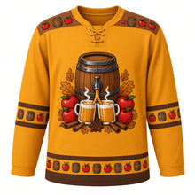 Load image into Gallery viewer, Ugly Thanksgiving Apple Cider Barrel Hockey Jersey in Cider Amber, front view – cider amber body with oak brown yoke with a crest of an oak cider barrel with a tap pouring hot cider into two steaming mugs with apples, cinnamon and star anise, mug-and-apple yoke, barrel-stave sleeve bands and a mini-barrel and apple hem band – custom name and number