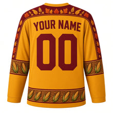 Load image into Gallery viewer, Ugly Thanksgiving Cornucopia Bounty Hockey Jersey in Harvest Gold, back view with a wheat-and-gourd yoke, wicker and corn sleeve bands, mini cornucopia hem band, arched YOUR NAME lettering and 00 – custom name and number