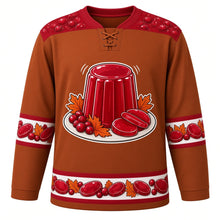 Load image into Gallery viewer, Ugly Thanksgiving Cranberry Sauce Wobble Hockey Jersey in Cinnamon Brown, front view – cinnamon brown body with cranberry red yoke with a glossy ridged ruby jelly cranberry sauce cylinder with jelly slices and cranberries on a white platter with autumn leaves (no labels, no brand), cranberry and jelly-slice yoke, sleeve bands and hem band – custom name and number