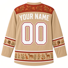 Load image into Gallery viewer, Ugly Thanksgiving Autumn Deer Meadow Hockey Jersey in Fawn Tan, back view with a rust autumn-leaf yoke, acorn and leaf sleeve bands, a fawn-and-leaf hem band, YOUR NAME lettering and 00 – custom name and number