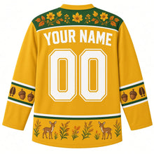 Load image into Gallery viewer, Ugly Thanksgiving Autumn Deer Meadow Hockey Jersey in Goldenrod Yellow, back view with a green goldenrod-and-flower yoke, hoof-print and acorn sleeve bands, a fawn hem band, YOUR NAME lettering and 00 – custom name and number