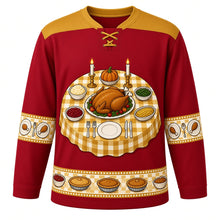 Load image into Gallery viewer, Ugly Thanksgiving Turkey Dinner Table Hockey Jersey in Cranberry Red, front view – cranberry red body with roast gold yoke with a round crest of a dinner table seen from above with a golden roast turkey platter, candlesticks and side dishes, checkered tablecloth and cutlery yoke, plate and drumstick sleeve bands and a side-dish hem band – custom name and number