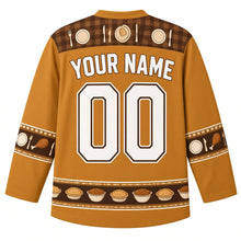 Load image into Gallery viewer, Ugly Thanksgiving Turkey Dinner Table Hockey Jersey in Roast Gold, back view with a checkered tablecloth and cutlery yoke, plate and drumstick sleeve bands, side-dish hem band, arched YOUR NAME lettering and 00 – custom name and number