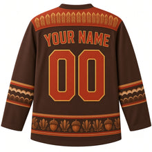 Load image into Gallery viewer, Ugly Thanksgiving Turkey Feather Fan Hockey Jersey in Turkey Bronze, back view with a feather-chevron yoke, striped-feather sleeve bands, mini feather-fan and acorn hem band, arched YOUR NAME lettering and 00 – custom name and number