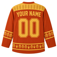 Load image into Gallery viewer, Ugly Thanksgiving Turkey Feather Fan Hockey Jersey in Copper Red, back view with a wheat-stalk yoke, leaf-motif sleeve bands, leaf and acorn hem band, arched YOUR NAME lettering and 00 – custom name and number
