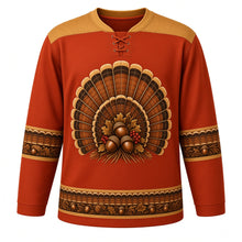 Load image into Gallery viewer, Ugly Thanksgiving Turkey Feather Fan Hockey Jersey in Copper Red, front view – copper red body with wheat gold yoke with a round crest of a giant half-circle sunburst fan of barred bronze, copper, chestnut and cream turkey tail feathers with gold tips around a center cluster of acorns, oak leaves and red berries, feather-chevron yoke, striped-feather sleeve bands and a mini feather-fan and acorn hem band – custom name and number