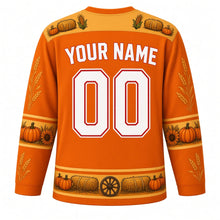 Load image into Gallery viewer, Ugly Thanksgiving Hayride Haystack Hockey Jersey in Pumpkin Orange, back view with a hay-bale, corn and wheat yoke, pumpkin and sunflower sleeve bands, hay-bale and wagon-wheel hem band, arched YOUR NAME lettering and 00 – your name and number