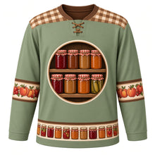 Load image into Gallery viewer, Ugly Thanksgiving Mason Jar Preserves Hockey Jersey in Sage Green, front view – sage green body with apple butter brown gingham yoke with a round crest of a rustic wooden pantry shelf of blank label-free glass canning jars glowing with cranberry jam, apple butter, peach preserves and pickles under red-and-white gingham lids, cream sleeve bands of peaches, apples and cranberries and a mini canning-jar hem band – custom name and number
