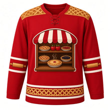 Load image into Gallery viewer, Ugly Thanksgiving Lattice Pie Bakery Hockey Jersey in Cherry Red, front view – cherry red body with pie crust gold yoke with a round crest of a sign-free bakery window with a scalloped striped awning and wooden shelves of golden lattice-top cherry, apple and blackberry pies with a steaming pie on the sill, lattice-crust yoke, pie-slice and rolling-pin sleeve bands and a mini lattice-pie hem band – custom name and number