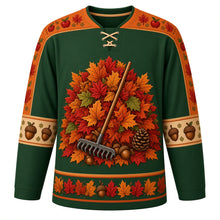 Load image into Gallery viewer, Ugly Thanksgiving Autumn Leaf Pile Hockey Jersey in Forest Green, front view – forest green body with burnt orange yoke with a round crest of a towering autumn leaf pile with a wooden rake, acorns and pinecones, swirling-leaf yoke, acorn and pinecone sleeve bands and a leaf-pile hem band – custom name and number
