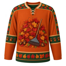 Load image into Gallery viewer, Ugly Thanksgiving Autumn Leaf Pile Hockey Jersey in Burnt Orange, front view – burnt orange body with forest green yoke with a round crest of a towering autumn leaf pile with a wooden rake, acorns and pinecones, swirling-leaf yoke, acorn and pinecone sleeve bands and a leaf-pile hem band – custom name and number