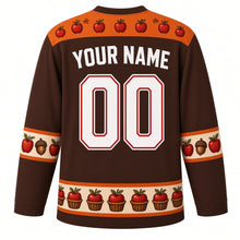 Load image into Gallery viewer, Ugly Thanksgiving Apple Orchard Harvest Hockey Jersey in Cider Brown, back view with an apple blossom and maple leaf yoke, apple and acorn sleeve bands, apple-basket and pie hem band, arched YOUR NAME lettering and 00 – your name and number