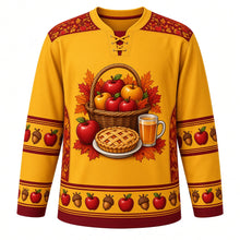 Load image into Gallery viewer, Ugly Thanksgiving Apple Orchard Harvest Hockey Jersey in Harvest Gold, front view – harvest gold body with burgundy yoke with an overflowing apple basket crest with a lattice apple pie and cider mug, apple-and-leaf yoke, apple and acorn sleeve bands and an apple-basket hem band – custom name and number