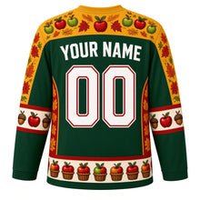 Load image into Gallery viewer, Ugly Thanksgiving Apple Orchard Harvest Hockey Jersey in Orchard Green, back view with an apple blossom and maple leaf yoke, apple and acorn sleeve bands, apple-basket and pie hem band, arched YOUR NAME lettering and 00 – your name and number