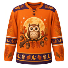 Load image into Gallery viewer, Ugly Thanksgiving Harvest Moon Owl Hockey Jersey in Harvest Moon Orange, front view – harvest moon orange body with deep plum yoke with a round crest of a fluffy wide-eyed cartoon owl on an acorn-laden oak branch before a giant orange harvest moon, feather-and-star yoke, acorn and oak-leaf sleeve bands and an owl-and-moon hem band – custom name and number