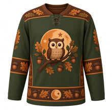 Load image into Gallery viewer, Ugly Thanksgiving Harvest Moon Owl Hockey Jersey in Moss Green, front view – moss green body with chestnut brown yoke with a round crest of a fluffy wide-eyed cartoon owl on an acorn-laden oak branch before a giant orange harvest moon, feather-and-star yoke, acorn and oak-leaf sleeve bands and an owl-and-moon hem band – custom name and number