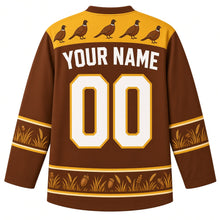Load image into Gallery viewer, Ugly Thanksgiving Woodland Pheasant Brush Hockey Jersey in Pheasant Copper, back view – copper body with a gold yoke showing a row of small pheasants, golden grass sleeve bands and an oak leaf and acorn hem band with YOUR NAME and 00 – custom name and number
