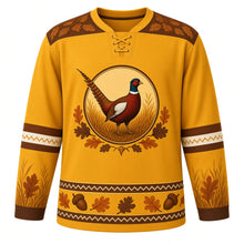 Load image into Gallery viewer, Ugly Thanksgiving Woodland Pheasant Brush Hockey Jersey in Grassland Gold, front view – gold body with a brown yoke, oval crest of a ring-necked pheasant in golden grass framed by oak leaves, grass prints on the lower sleeve bands and an acorn and oak leaf hem band – custom name and number