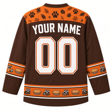Load image into Gallery viewer, Ugly Thanksgiving Autumn Raccoon Raid Hockey Jersey in Chestnut Brown, back view with an orange paw-print and leaf yoke, pie-and-raccoon sleeve bands, a raccoon-and-pie hem band, YOUR NAME lettering and 00 – custom name and number