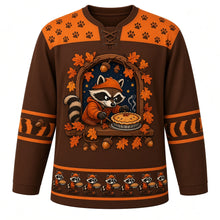 Load image into Gallery viewer, Ugly Thanksgiving Autumn Raccoon Raid Hockey Jersey in Chestnut Brown, front view – masked raccoon in an orange hat and hoodie holding a pie in a wooden window frame with a starry night sky, autumn leaves, orange paw-print yoke and a raccoon-and-pie hem band – custom name and number