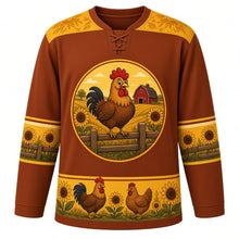 Load image into Gallery viewer, Ugly Thanksgiving Farmhouse Rooster Hockey Jersey in Rust Brown, front view – rust brown body with sunflower yellow yoke with a round crest of a plump storybook cartoon rooster crowing on a split-rail fence between tall sunflowers with a red barn and golden fields behind, sunflower-and-feather yoke, fence-rail and sunflower sleeve bands and a rooster-hen-sunflower hem band – custom name and number
