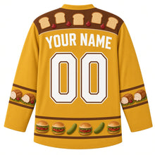 Load image into Gallery viewer, Ugly Thanksgiving Leftover Sandwich Stack Hockey Jersey in Mustard Gold, back view with a yoke of bread slices and cranberry dollops, roast turkey-roll sleeve bands, a mini-sandwich and pickle hem band, arched YOUR NAME lettering and 00 – custom name and number