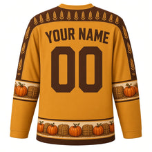 Load image into Gallery viewer, Ugly Thanksgiving Scarecrow Field Hockey Jersey in Wheat Gold, back view with a corn and wheat yoke, patchwork sleeve bands, pumpkin and hay bale hem band, arched YOUR NAME lettering and 00 – custom name and number