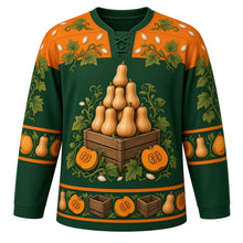 Load image into Gallery viewer, Ugly Thanksgiving Butternut Squash Stack Hockey Jersey in Forest Green, front view – forest green body with squash orange yoke with a round crest of a teetering tower of butternut squashes stacked on a wooden crate with curling green vines and leaves and a halved squash showing orange flesh and seeds, squash-seed and vine yoke, mini butternut sleeve bands and a butternut-and-crate hem band – custom name and number