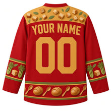 Load image into Gallery viewer, Ugly Thanksgiving Stuffing Stockpot Hockey Jersey in Paprika Red, back view with a bread-cube and sage-leaf yoke, celery and bread-cube sleeve bands, a hem of bread loaves and spoons, arched YOUR NAME lettering and 00 – custom name and number