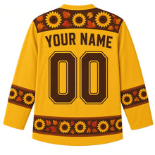 Load image into Gallery viewer, Ugly Thanksgiving Sunflower Harvest Field Hockey Jersey in Sunflower Gold, back view with a sunflower-seed yoke, sunflower-and-leaf sleeve bands, sunflower-head and autumn-leaf hem band, arched YOUR NAME lettering and 00 – custom name and number
