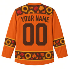 Load image into Gallery viewer, Ugly Thanksgiving Sunflower Harvest Field Hockey Jersey in Burnt Orange, back view with a sunflower-seed yoke, sunflower-and-leaf sleeve bands, sunflower-head and autumn-leaf hem band, arched YOUR NAME lettering and 00 – custom name and number