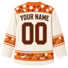 Load image into Gallery viewer, Ugly Thanksgiving Sweet Potato Casserole Hockey Jersey in Marshmallow Cream, back view with a marshmallow-and-pecan yoke, sweet potato slice sleeve bands, mini casserole hem band, arched YOUR NAME lettering and 00 – custom name and number