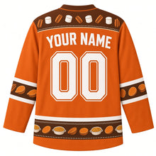 Load image into Gallery viewer, Ugly Thanksgiving Sweet Potato Casserole Hockey Jersey in Sweet Potato Orange, back view with a marshmallow-and-pecan yoke, sweet potato slice sleeve bands, mini casserole hem band, arched YOUR NAME lettering and 00 – custom name and number