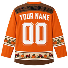 Load image into Gallery viewer, Ugly Thanksgiving Pumpkin Patch Tractor Hockey Jersey in Pumpkin Orange, back view with a black tire-track yoke, cream and walnut brown pumpkin-vine sleeve bands, a cream and walnut brown tiny tractor and pumpkin hem band, arched YOUR NAME lettering and 00 – custom name and number