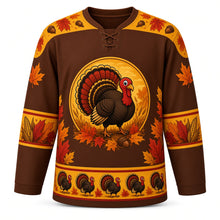 Load image into Gallery viewer, Ugly Thanksgiving Strutting Turkey Hockey Jersey in Chestnut Brown, front view – chestnut brown body with golden yellow yoke with a round cartoon strutting turkey crest with a fanned autumn tail on a wheat field, feather-and-acorn yoke, feather and corn sleeve bands and a strutting-turkey hem band – custom name and number