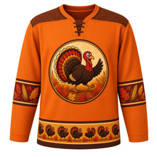 Load image into Gallery viewer, Ugly Thanksgiving Strutting Turkey Hockey Jersey in Harvest Orange, front view – harvest orange body with chestnut brown yoke with a round cartoon strutting turkey crest with a fanned autumn tail on a wheat field, feather-and-acorn yoke, feather and corn sleeve bands and a strutting-turkey hem band – custom name and number