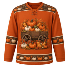 Load image into Gallery viewer, Ugly Thanksgiving Pumpkin Wagon Haul Hockey Jersey in Rust Orange, front view – rust orange body with walnut brown yoke with a wooden spoked-wheel wagon full of orange and white pumpkins with autumn leaves, wagon-wheel and pumpkin yoke, wagon-wheel and pumpkin sleeve bands and a pumpkin hem band – custom name and number