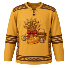 Load image into Gallery viewer, Ugly Thanksgiving Golden Wheat Sheaf Hockey Jersey in Golden Wheat, front view – golden wheat body with toasted brown yoke with a round golden wheat sheaf crest tied with a red bow beside a braided bread loaf, a grain basket and two field mice, wheat-ear yoke, braided-wheat sleeve bands and a wheat-bundle hem band – custom name and number