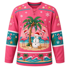 Load image into Gallery viewer, Ugly Christmas Tropical Beach Christmas Hockey Jersey in Flamingo Pink, front view – flamingo pink body with a light-strung palm tree, two flamingos in red festive hats and a snowman on the sand, starfish-and-seashell yoke, flamingo sleeve bands and a palm-tree-and-wave hem band – custom name and number