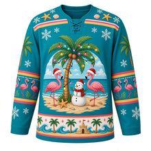 Load image into Gallery viewer, Ugly Christmas Tropical Beach Christmas Hockey Jersey in Tropical Teal, front view – tropical teal body with a light-strung palm tree with flamingos in red festive hats and a snowman on the sand, starfish-and-seashell yoke, flamingo sleeve bands and a palm-wave-and-sandcastle hem band – custom name and number