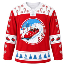 Load image into Gallery viewer, Ugly Christmas Bobsled Snow Run Hockey Jersey in Candy Red, front view – round crest of a red two-person bobsled with a white star on its nose racing down a snowy track lined with candy canes and pine trees on a candy red body, white candy-cane yoke, snowflake sleeves with bobsled elbow bands and a blue pine tree hem band – custom name and number