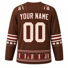 Load image into Gallery viewer, Ugly Christmas Cozy Bookshop Noel Hockey Jersey in Leather Brown, back view with a stacked-book and tiny-tree yoke, red-striped open-book sleeve bands, a red and cream book-spine hem band, cream YOUR NAME and 00 – your name and number